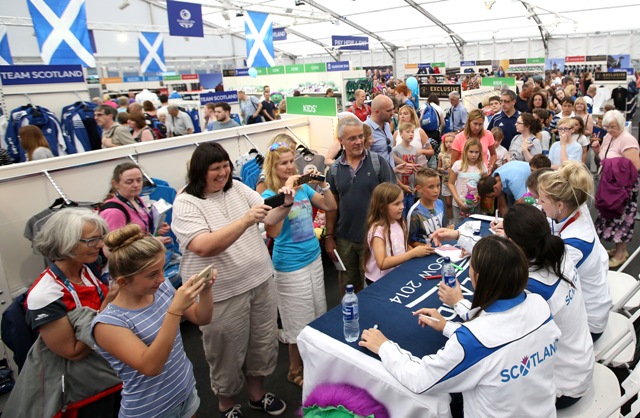 Scotland's female judo medallists signing autographs at the Glasgow 2014 Superstore in George Square ©Glasgow 2014