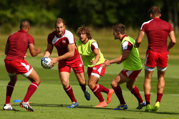 Mark Bright of England passes during an England sevens training session ahead of Glasgow 2014 ©Getty Images