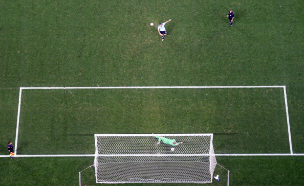 Maxi Rodriguez scoring the penalty which sent Argentina into the final ©AFP/Getty Images