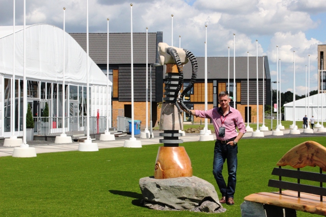Nessie with sculptor Stuart Murdoch as it takes up residence at the Glasgow 2014 Athletes' Village ©Glasgow 2014