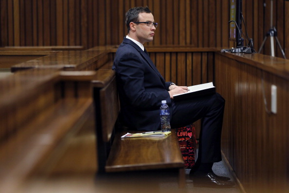 Oscar Pistorius listened to a second day of evidence from sports medicine Professor Wayne Derman ©AFP/Getty Images