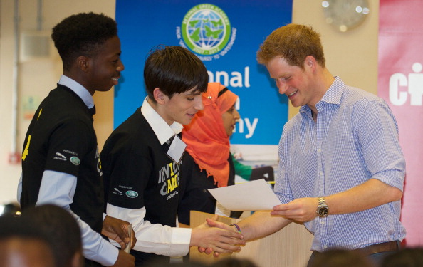 Prince Harry handed participants their certificates as they completed the social media training ahead of the inaugural Invictus Games in September ©AFP/Getty Images