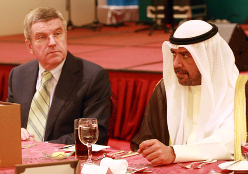 Sheikh Ahmad Al-Fahad Al-Sabah, pictured with International Olympic Committee President Thomas Bach, is more confident about Rio 2016 following the FIFA World Cup but warned they are still "not satisfied" ©OCA