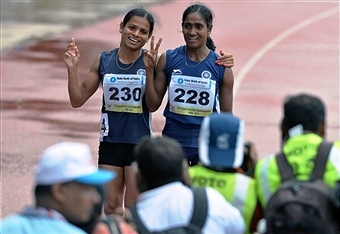 Sprinter Dutee Chand (left) has been embroiled in a gender row after being left out of the Indian athletics squad for Glasgow 2014 ©AFP/Getty Images