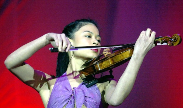 Vanessa Mae shot to fame as a talented musician earning her worldwide acclaim ©AFP/Getty Images