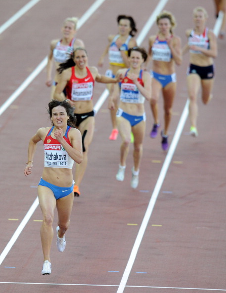 Russia's Yelena Arzhakova, pictured winning the 2012 European 800m in Helsinki, was subsequently stripped of her title following a doping ban. The gold went belatedly to Lynsey Sharp, pictured back left, whose final charge took her into silver medal position on the day ©Getty Images