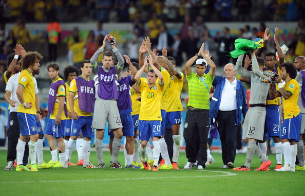 Brazil's stunned players and manager Felipe Scolari bid farewell to their supporters after their 7-1 World Cup semi-final defeat by Germany ©Getty Images