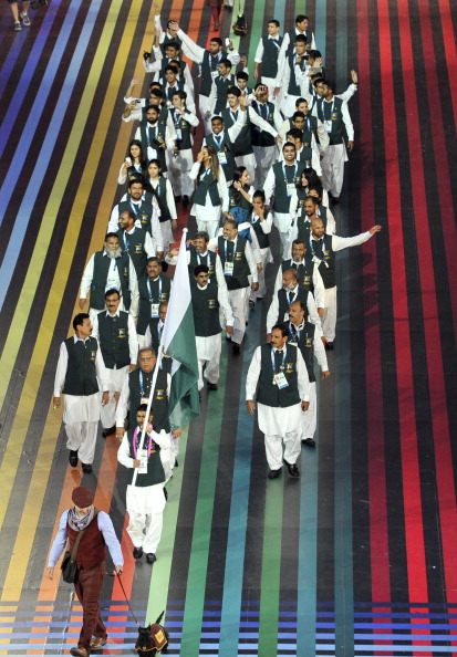 Pakistan's team is preceded at the Glasgow 2014 Opening Ceremony by - a Scottie dog! Genius. ©AFP/Getty Images