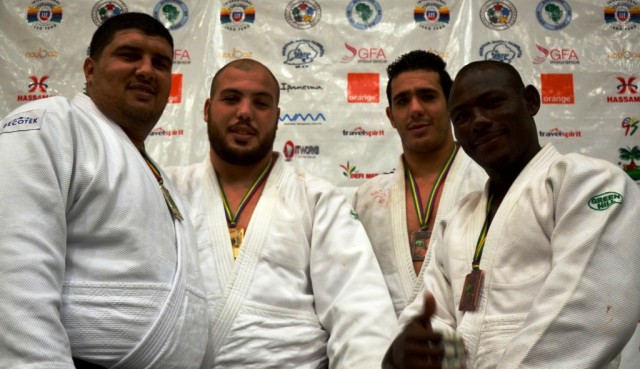 History-maker Faciel Jaballah (second from left) poses with his African gold medal in Port Louis ©IJF