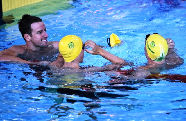 James Magnussen is already getting his digs in on team mates Cameron McEvoy (centre) and Tommaso D'Orsogna (right) after taking the 100m freestyle win ©AFP/Getty Images