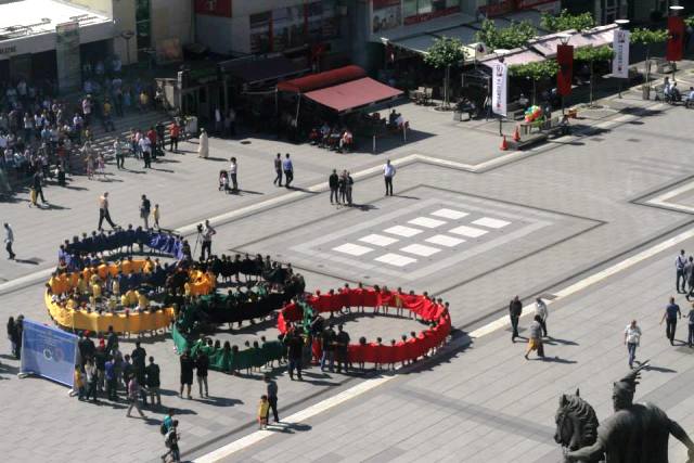 Participants took part in a special event to simulate the five Olympic rings in Pristina today ©KOC