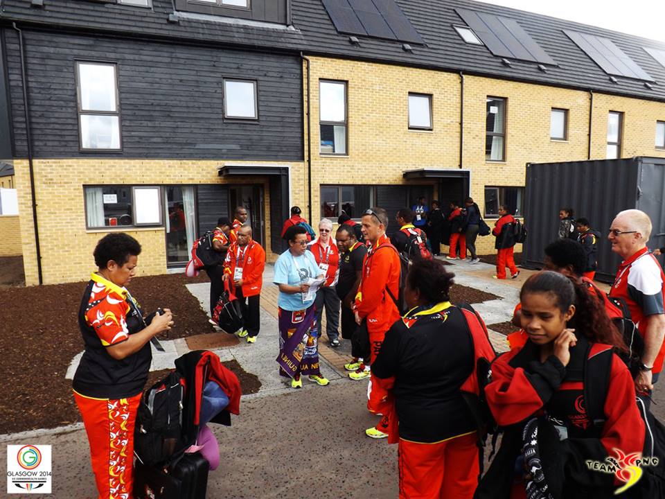 Team Papua New Guinea deputy general team manager Helen Havora (fifth left), informing Chef de Mission Emma Waiwai (left) and members of the Team on their room allocation at the Games Village ©Facebook