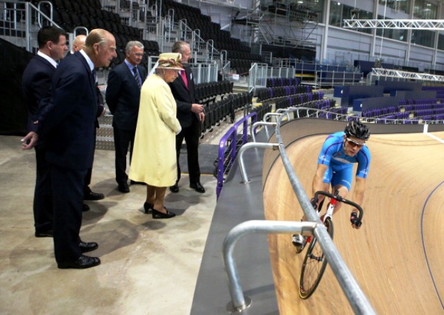 The Queen and the Duke of Edinburgh keep an eye on Scotland's cycling team as they train at the Sir Chris Hoy Velodrome ©Getty Images 