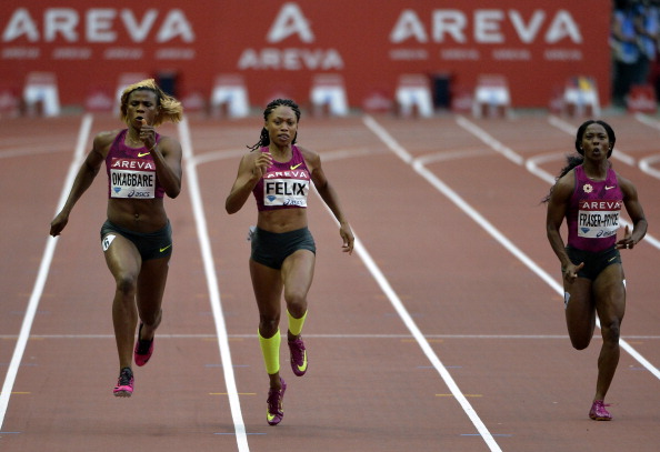 Blessing Okagbare (left) en route for 200m victory in Paris ahead of Olympic champion Allyson Felix (centre) and World champion Shelly-Anne Fraser-Pryce ©AFP/Getty Images