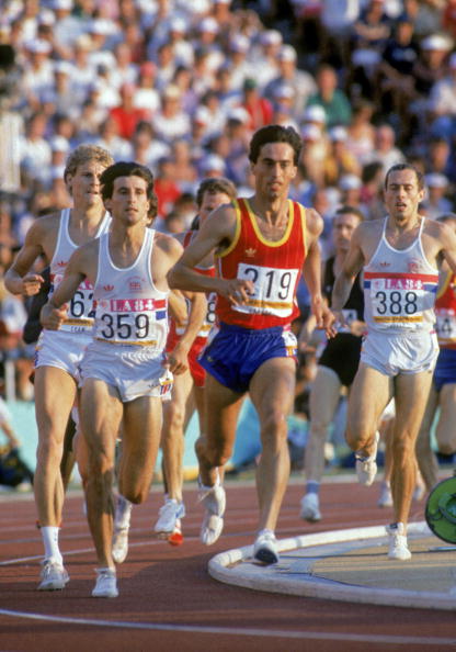 An exhausted Steve Ovett steps onto the infield soon after the bell in the 1984 Olympic 1500m final as Seb Coe tracks the leader, Jose-Manuel Abascal ©Getty Images