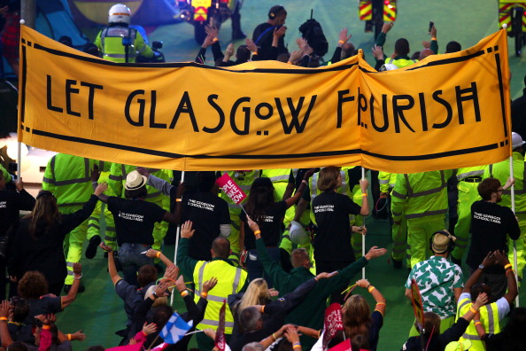 A banner brought in by city workers with the message "Let Glasgow Flourish" ©Getty Images