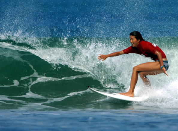 Akiko Kiyonaga of Japan participating in the surfing competition at the Asian Beach Games in Kuta Bali ©Getty Images