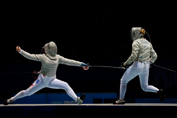 Alina Moseyko of Russia (left) took sabre fencing gold ©Getty Images