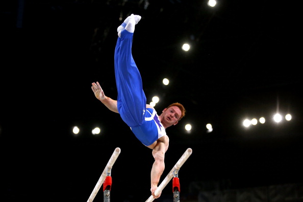 Daniel Purvis of Scotland won the country's second gymnastics gold at Glasgow 2014 with victory in the parallel bars ©Getty Images