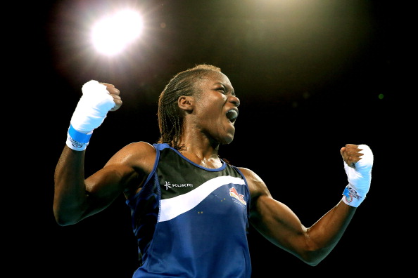 England's Nicola Adams made history by winning the first Commonwealth Games women's boxing gold medal after defeating Northern Ireland's Michaela Walsh in the flyweight division ©Getty Images