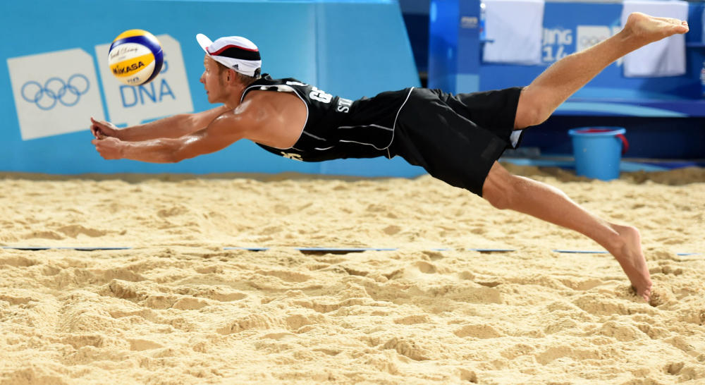 Eric Stadie of Germany in the men's beach volleyball quarter-final match ©Nanjing 2014