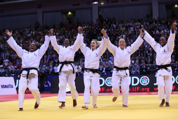 The French celebrate their victory over Mongolia in the women's event event ©IJF