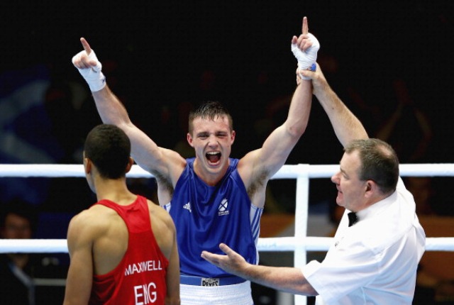 Josh Taylor celebrates as the referee declares him the winner over Sam Maxwell of England ©Getty Images 