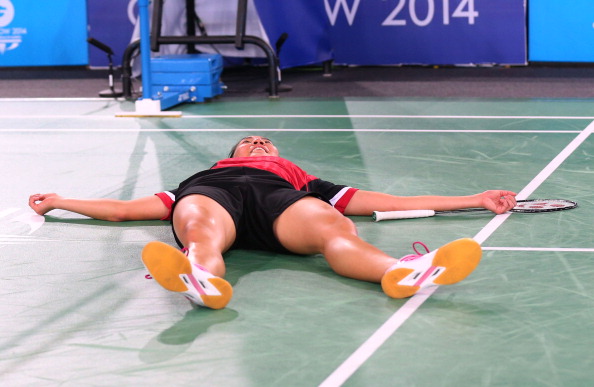 Michelle Li collapses to the ground after winning the gold medal ©Getty Images 