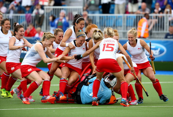 Goalkeeper Maddie Hinch of England was mobbed by her team mates after making the decisive save in the penalty shootout against New Zealand to see them through to the final of the women's hockey ©Getty Images