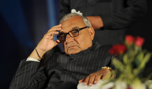 Haryana chief Minister Bhupinder Singh Hooda was the man given the honour of handing out the envelopes at the ceremony ©Getty Images