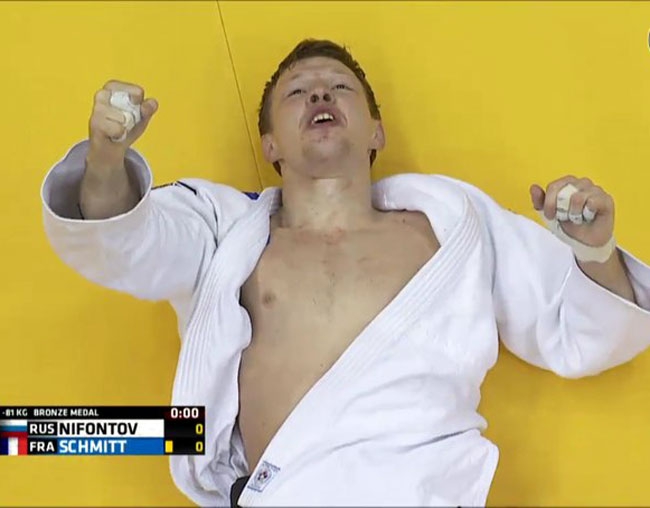 Ivan Nifontov gave the Russian fans something to cheer with a bronze medal, beating France's Alain Schmitt ©World Judo Championships 2014 Chelyabinsk
