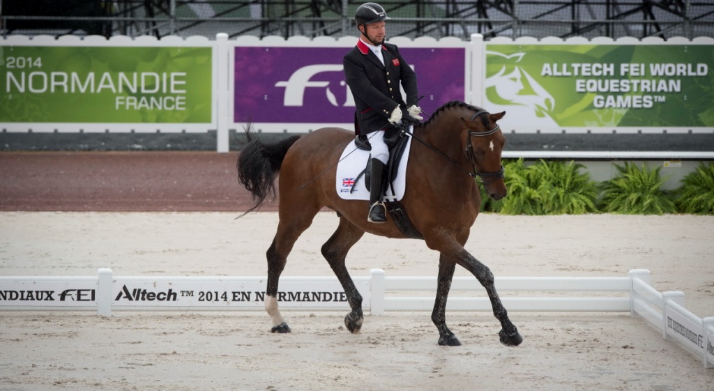 Lee Pearson riding Zion took the Grade Ib in round one of the team competition with 77.960 per cent at the World Equestrian Games ©Dirk Caremans/FEI