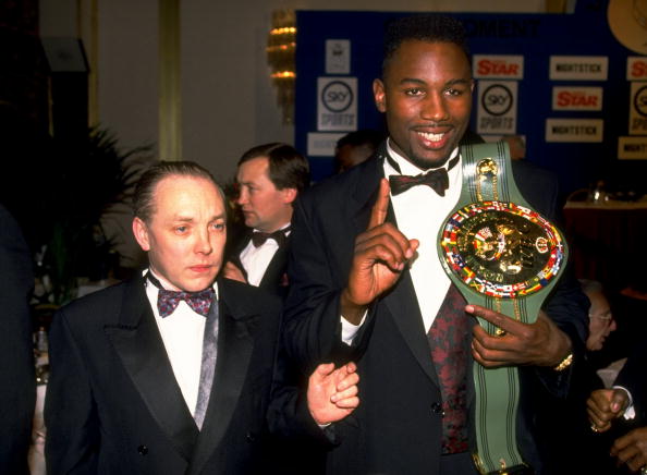 Lennox Lewis (right) has said he respects the decision of his former promoter, now known as Kellie Maloney ©Getty Images