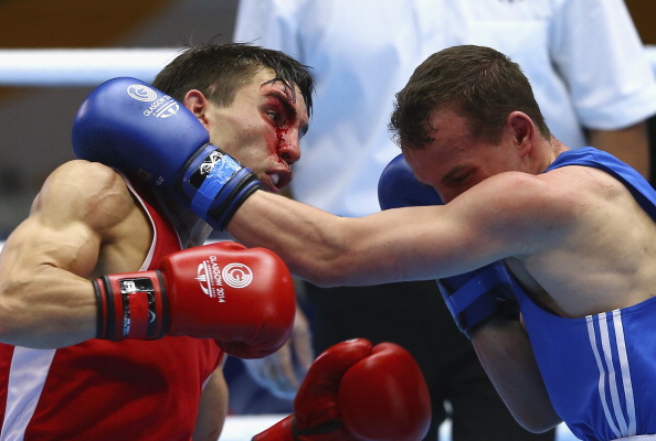 Michael Conlan (red) added to Northen Ireland's boxing delight after making the bantamweight final with victory over Sean McGoldrick of Wales ©Getty Images