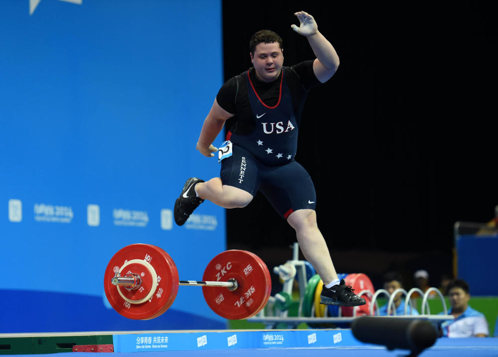 Ryan Sennett of the United States failed to make a clean lift in the men's over 85kg weightlifting ©Nanjing 2014