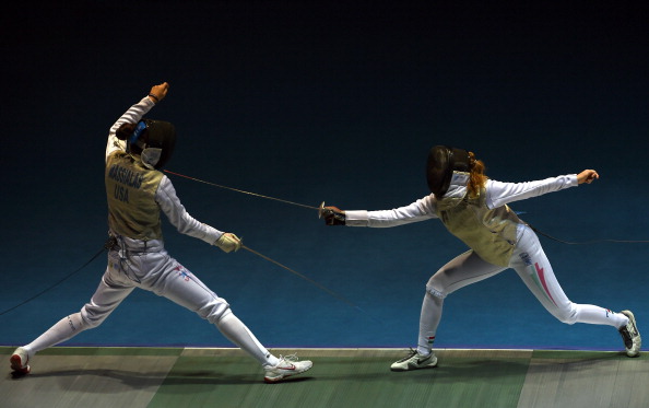 Sabrina Massialas (left) of the United States won gold in the women's foil individual ©Getty Images