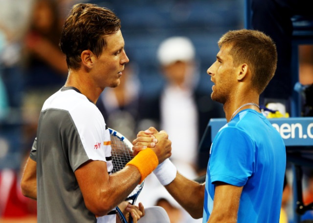 Tomas Berdych (left) came through a tough five set match against Martin Klizan in New York ©Getty Images