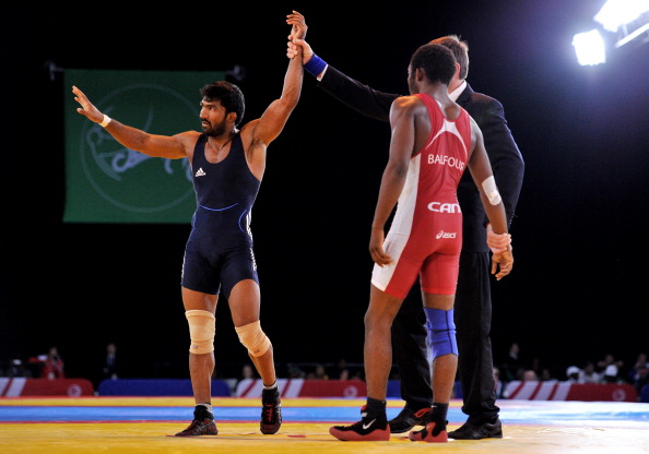 Yogeshwar Dutt of India celebrates a fifth gold for India ©AFP/Getty Images