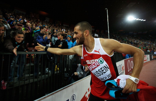 Kariem Hussein accepts congratulations on his lap of honour after winning the 400m hurdles, Switzerland's first European Championships track gold since 1969 ©Getty Images