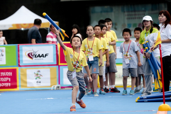 A boy throws an imitation javelin ©Getty Images