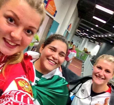 All's fair in love and war... The three women's shot put medallists share a selfie ©Twitter