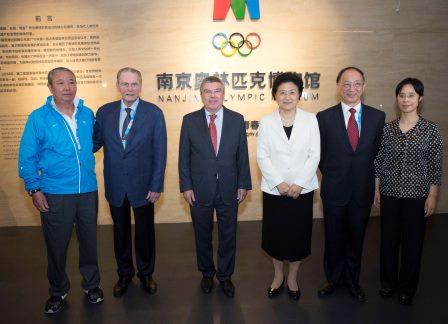 Jacques Rogge (second left) and Yu Zaiqing (left) were others in attendance at the opening today ©IOC/Ian Jones