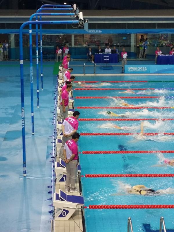 Officials gettting a good look at Chinese domination in the swimming ©Twitter
