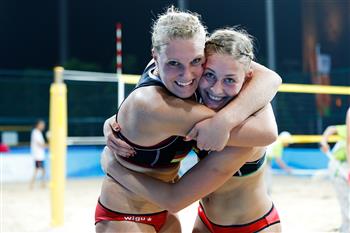 Sarah Schneider and Lisa Arnholdt of Germany celebrate victory ©FIVB