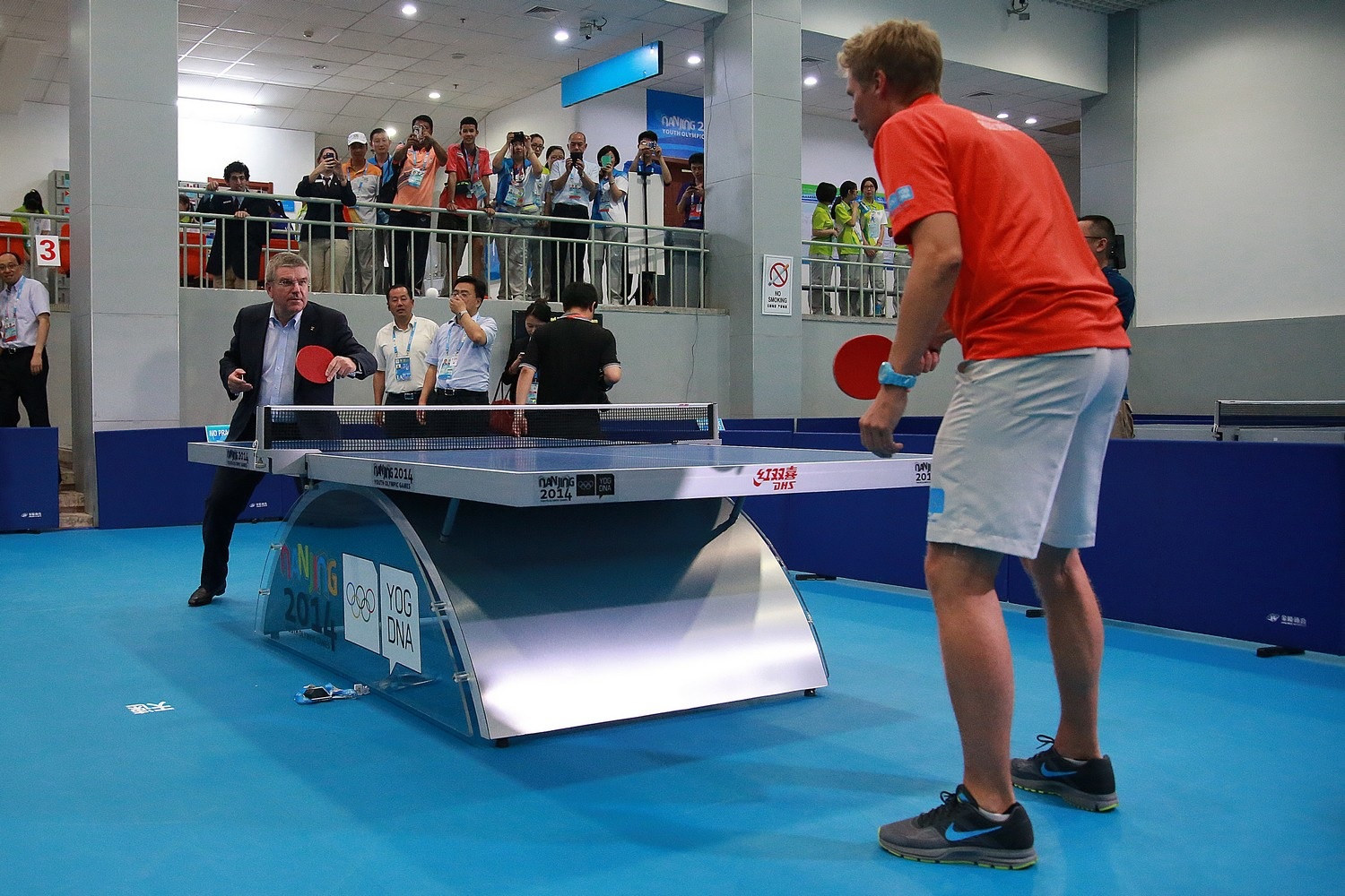 Thomas Bach practices some table tennis with Swedish great Jorgen Persson ©ITTF
