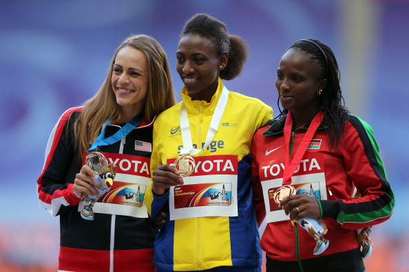 Jennifer Simpson (left) shows her silver medal after last year's 1500m final at the World Championships in Moscow, alongside champion Abeba Aregawi and (right) bronze medallist Hellen Obiri of Kenya ©Getty Images