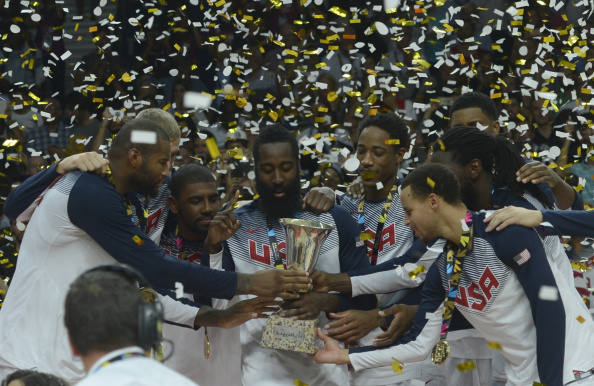 All hands were on the coveted trophy as the United States celebrated their triumph ©Getty Images