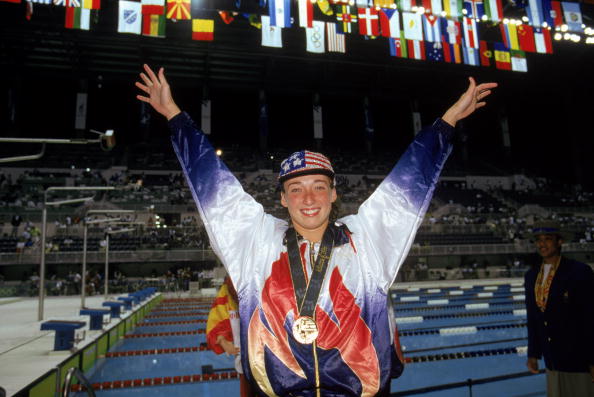 Amy Van Dyken-Rouen observes the US national anthem after winning 50m freestyle gold in Atlanta 1996 ©Getty Images