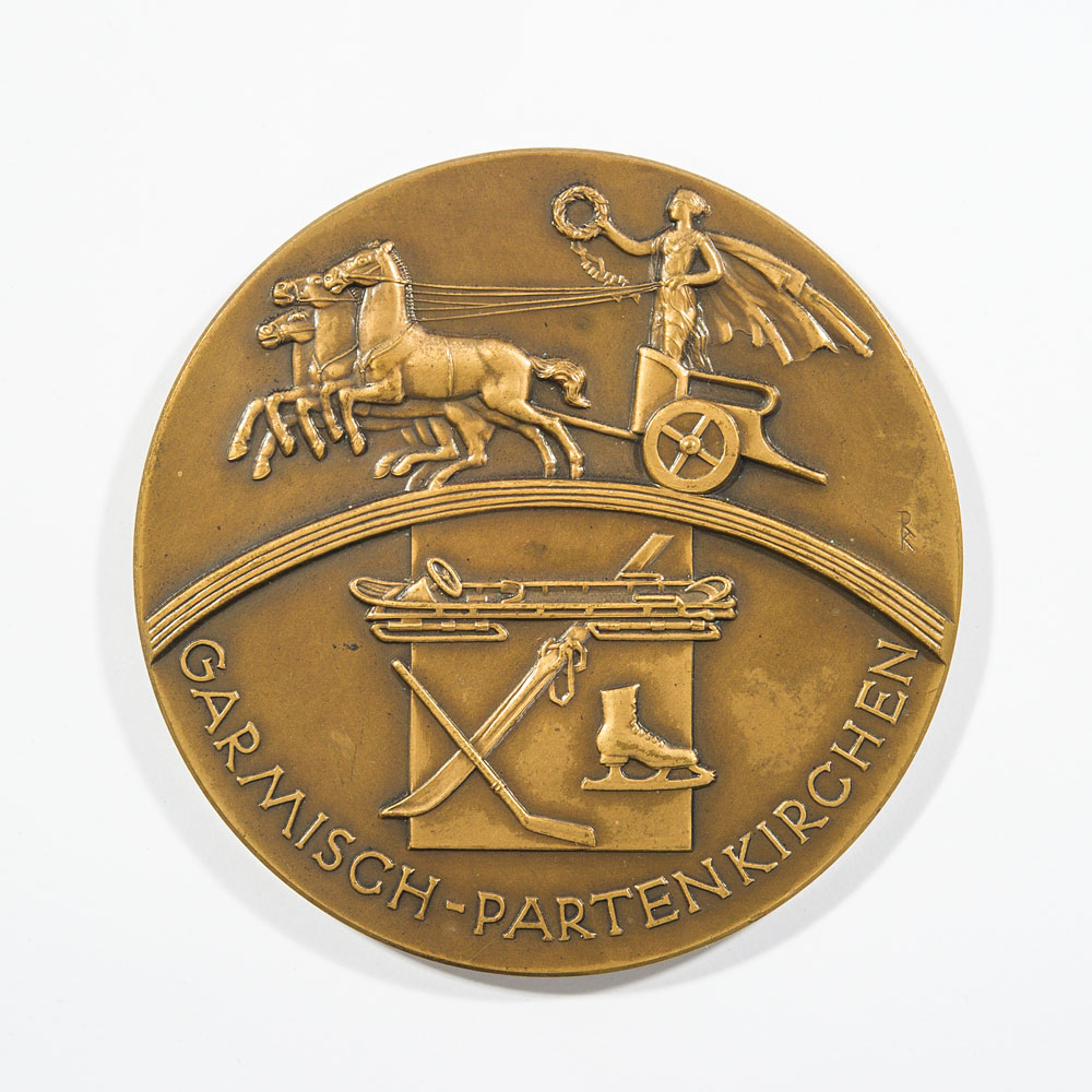 An "incredibly rare" Garmisch-Partenkirchen 1936 Winter Olympics bronze medal made $22,500 at the auction ©RR Auction