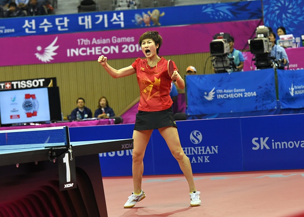 Ding Ning celebrates as she earns China team gold ©AFP/Getty Images